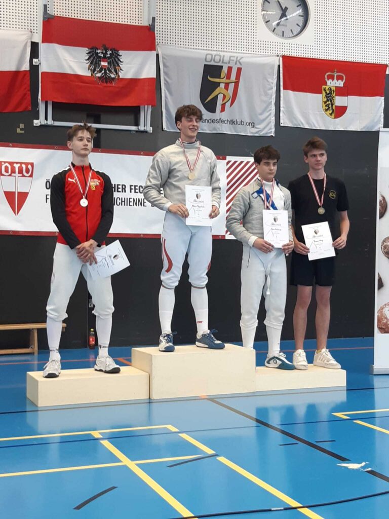 Siegerehrung - 1. Felix Popotnik (SU Wien), 2. Jaden Nemec (FU Mödling), 3. Aron Höllrigl (FU Mödling)/Thiemo May (Fencing Club Villach) © Fencing Club Villach